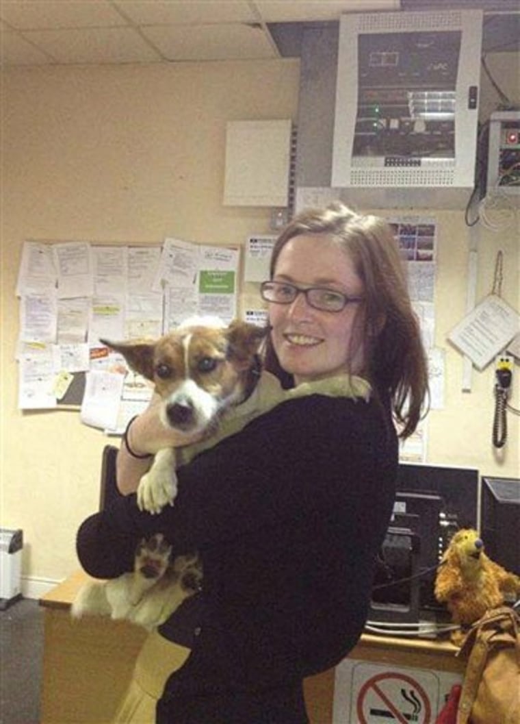 Deirdre Anglin is reunited with her Jack Russell terrier Patch Wednesday July 4, 2012 in Dublin, Ireland.